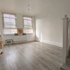 Photo 5: Living area (kitchen is up the stairs)