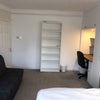 Photo 3: room also benefits from IKEA sofa bed, bookcase and coffee table 
