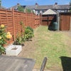 Photo 9: Back gardens with patio lawn and garage.
