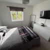 Photo 2: Bedroom with 40” Smart TV
