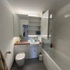 Photo 4: The bathroom (right cupboard would be yours)