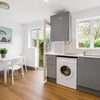 Photo 5: Kitchen shared with two other people 