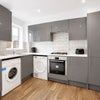 Photo 7: Kitchen shared with two other people 