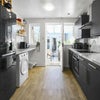 Photo 6: Stunning kitchen leading onto the airy conservatory.