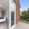 Photo 3: French doors to bedroom