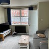 Photo 2: Bedroom - facing other direction. TV and sofa bed included