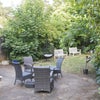 Photo 9: Big backyard with patil furniture 