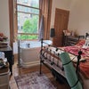 Photo 4: Double bedroom with bathtub