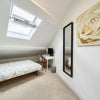Photo 3: Bedroom 3 Bright and comfortable furnished bedroom.