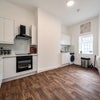 Photo 6: Kitchen Fully equipped modern kitchen with ample storage and workspace.