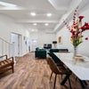Photo 9: Dining Area Generous dining space ideal for shared meals and team gatherings.
