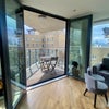 Photo 4: Balcony with patio