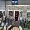 Photo 2: Front of Property