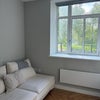 Photo 2: Living space (nice view of the common!)