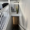 Photo 3: Door at bottom of stairs
