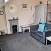 Photo 3: Large spacious double bedroom with sofa.
