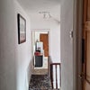 Photo 4: Landing leading from double bedroom to kitchen and shower room.