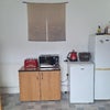 Photo 7: SHARED Kitchen with toaster, kettle, own fridge.