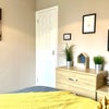 Photo 16: Room 2: Lots of storage with built in wardrobe and ottoman bed.