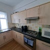 Photo 7: Own fridge/Freezer and cupboards