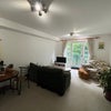 Photo 4: Living room with included furniture (owned by current tenant)