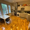 Photo 4: Kitchen / living area