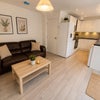 Photo 2: Communal Lounge and Kitchen