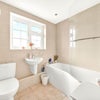 Photo 2: Shared Bathroom
