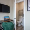 Photo 2: Room 1 - features ensuite, desk & Smart TV