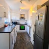 Photo 5: Kitchen, with Washer-Dryer