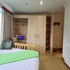 Photo 2: 120cms bed in sunny rm with blackout curtains