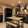 Photo 14: COMMUNAL KITCHEN