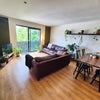 Photo 3: Large Open plan dining and lounge room