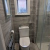Photo 9: Smaller downstairs toilet and bathroom 
