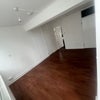 Photo 5: View from balcony entrance. Kitchen across 