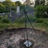 Photo 9: Outside built into ground firepit.