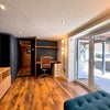 Photo 5: Basement lounge with desk