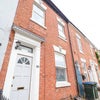 Photo 7: Front Of the Property