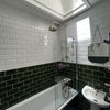 Photo 8: Bathroom with bath and shower