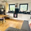 Photo 2: Shared living room/kitchen