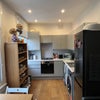Photo 2: Modern kitchen with washing machine & dryer 