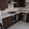 Photo 5: Kitchen (AI - as being renovated but identical)