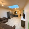 Photo 3: Living room with open plan kitchen 