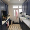 Photo 6: The kitchen is equipped with all you might need, incl dishwasher and washing machine.