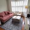Photo 2: The lovely cosy lounge. We have most streaming services. This room is a great nook on a rainy day.
