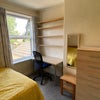 Photo 2: rear bedroom - available 25 Aug.