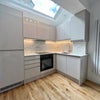 Photo 2: Living room/kitchen