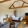 Photo 6: Sofa, double bed, wardrobe, chest of drawers and TV