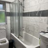 Photo 5: Downstairs bathroom with shower