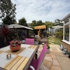 Photo 9: Multiple Seating/Entertainment Areas in the Garden